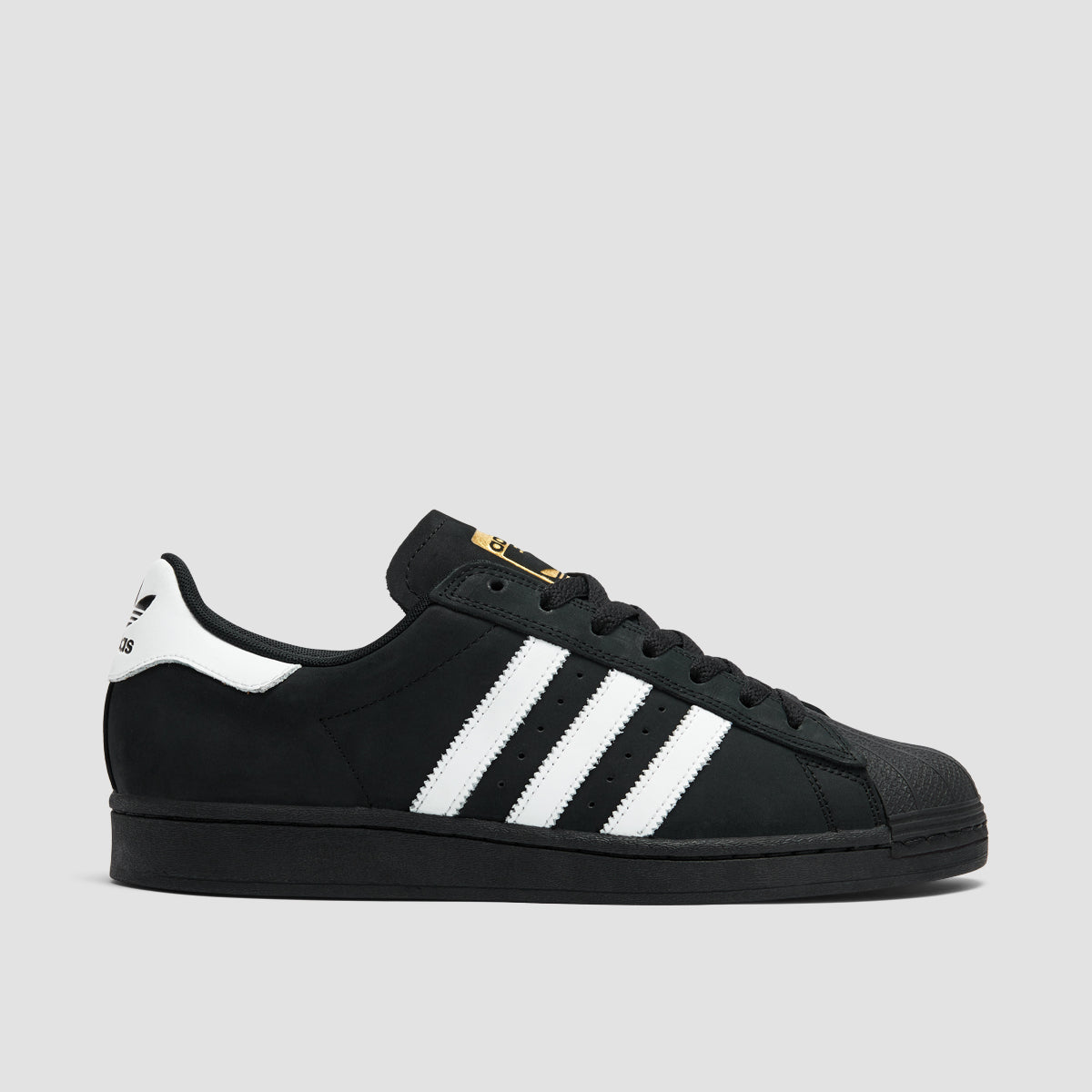 Adidas superstar black and gold on feet best sale